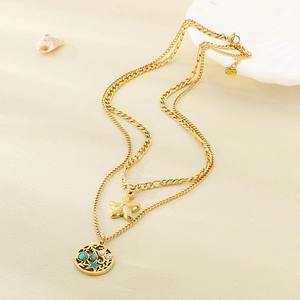 Collier double épaisseur doré avec pendentif étoile de mer et perle turquoise