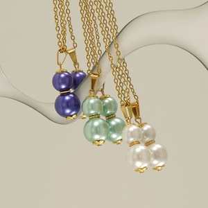 Elegant 18k stainless steel necklaces with pearl gourd pendants in gold, purple, and green