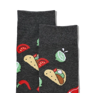Close-up of dark grey cotton crew socks with tacos and chili pepper knitting pattern