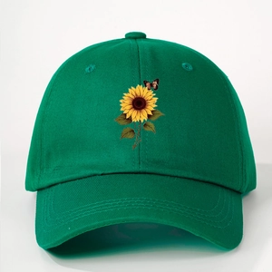 Dark green baseball cap with sunflower and butterfly print on a six-panel cotton crown