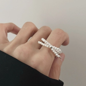 Minimalist 925 silver ring featuring a dainty white pearl bow design for women