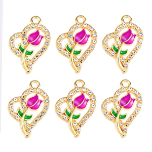 Macro detail of six purple tulip heart charms with gold metal base and white zircons