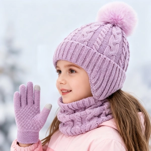 Detailed cable knit pattern on lilac winter set featuring a soft faux fur pom-pom