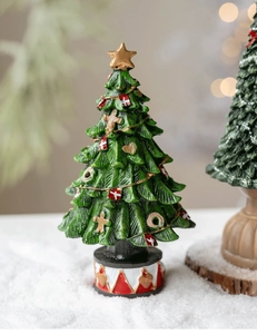 Miniature resin Christmas tree with Nordic flags and stars on a snowy base