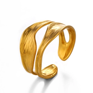 Modern 18K gold-plated irregular wavy cuff bracelet with organic textured leaf pattern