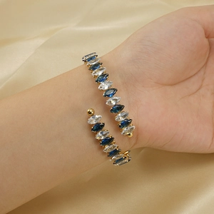 Adjustable 18K gold-plated wrap bracelet with marquise-cut blue and white zircon stones