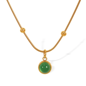 Vintage titanium steel necklace with a green glass stone pendant and gold beads