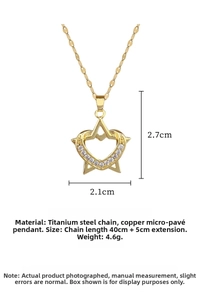 Detail of heart and star pendant with zirconia, 2.7cm size on titanium steel chain