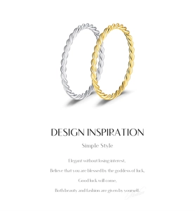 Detailed view of twisted minimalist silver rings in gold and silver finish options