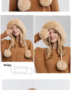 Detail of beige winter faux fur hat featuring thick plush texture and large pom-poms