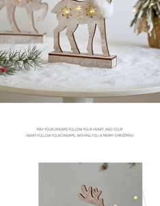 Detail of wooden Christmas reindeer featuring glowing LED snowflakes and white fur trim