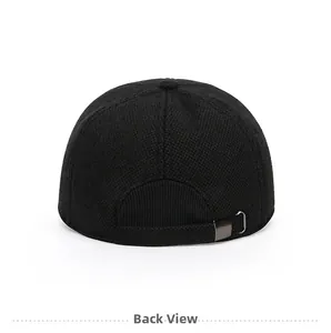 Detail back view of a black knitted baseball cap showing the metal adjustment buckle