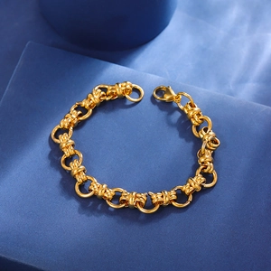 Macro shot of 11mm gold titanium steel chain bracelet with lobster clasp and thick links