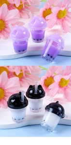 Close-up of miniature bubble tea keychains with cat ear lids and purple resin milk tea
