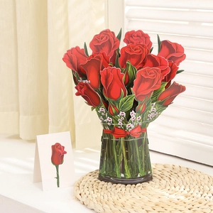 3D popup greeting card featuring red roses in a vase with a ribbon on a window sill