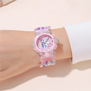 Pink silicone strap of the kids watch featuring a 3D colorful cartoon unicorn decoration