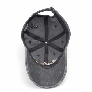 Inside view of vintage washed cotton baseball cap with 100% cotton label and gold embroidery