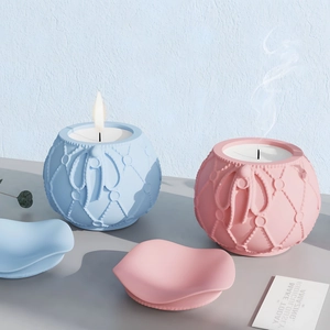 Detailed relief pattern on ceramic aromatherapy candle jars with elegant ribbon design