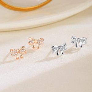 Sparkling 925 sterling silver bow stud earrings with white zircon in rose gold and silver
