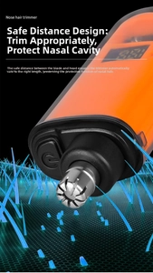 Close-up of electric nose hair trimmer with safety guard design and stainless steel blade