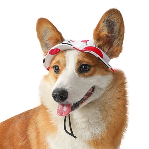 Dog sun hat with red polka dots on white canvas, featuring adjustable chin strap for pets