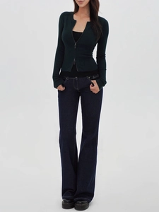 Retro low waist slim fit flare jeans with a dark blue wash for a trendy aesthetic