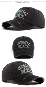 Detailed close-up showing vintage washed cotton texture and 3D embroidery on black cap