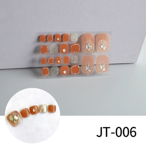 Detail of JT-006 orange and nude toe nail stickers with silver sequins and rhinestones