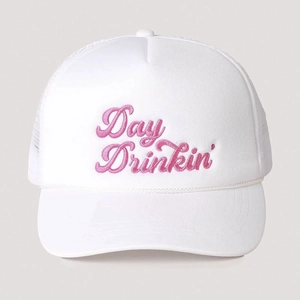 White trucker hat featuring pink Day Drinkin' embroidery and breathable mesh back