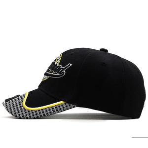 Side view detail of black cotton baseball cap with 3D embroidery and patterned brim