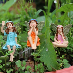 Set of 3 resin flower fairy garden stakes in blue, orange and pink for outdoor plant pots