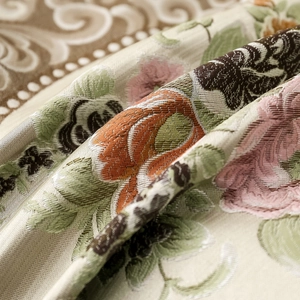 Elegant floral jacquard bolster pillow with detailed pink and orange embroidery