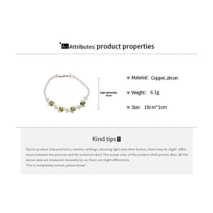 Detailed view of silver oval bracelet with green marquise cubic zirconia and dimensions