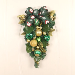 Christmas teardrop swag with green PVC pine needles, gold balls and Santa Claus ribbon