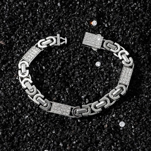 Hip hop silver chain bracelet with iced out rectangle charms on black crystal background