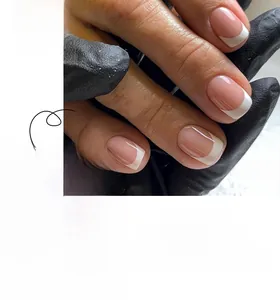 Short square press-on nails with classic French white tips and nude pink base color