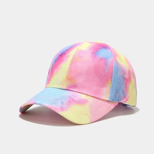 Detailed view of colorful tie-dye patterns on a cotton baseball cap with artistic gradients
