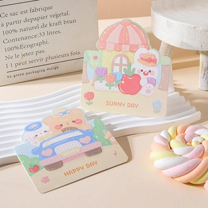Close-up of colorful cartoon animal greeting cards with Sunny Day and Happy Day text