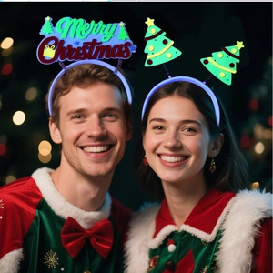 Close-up of glowing LED Christmas headbands with Merry Christmas text and tree patterns