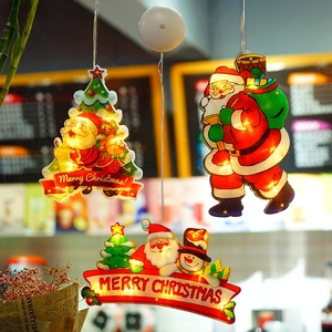 Warm LED Christmas window suction lights with Santa and snowman festive patterns