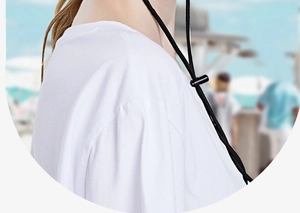 Detail of adjustable black chin strap on sun hat with plastic buckle toggle