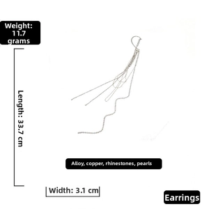 Detail of long silver tassel earrings with measurements and rhinestone pearl materials