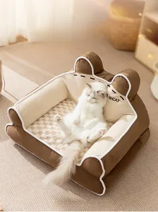 Detail view of plush cat sofa with cute ear-shaped backrest and WCAT embroidery