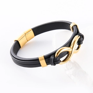 Bracciale alla moda in pelle nera con simbolo dell'infinito dorato e chiusura magnetica