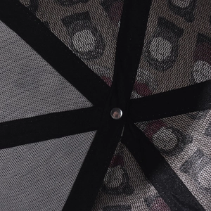Detail of the baseball cap's inner structure with mesh panels and silver metal rivet