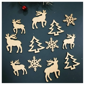 Detailed view of DIY Christmas wooden shapes including deer, snowflakes, and trees