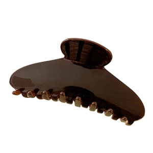 Classic dark brown acetate hair claw clip with glossy finish for elegant hair styling
