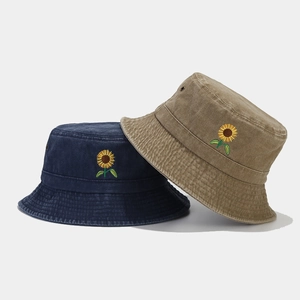 Washed vintage bucket hat with sunflower embroidery in navy and khaki cotton