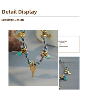 Detail of handmade woven necklace with 18k gold plated moon and key charms