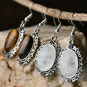 Vintage bohemian tiger eye and moonstone drop earrings with ornate silver engraving